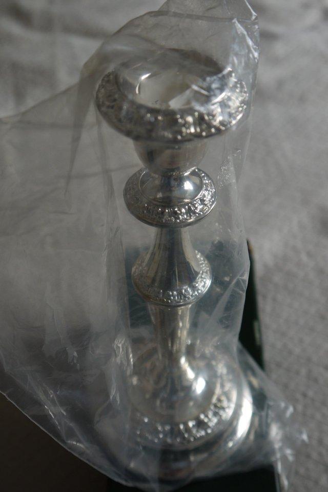 Preview of the first image of Silver plated 9" candlestick by Ianthe.