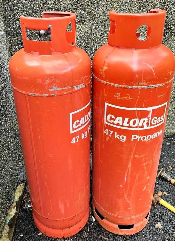 Preview of the first image of 2 x empty caravan bbq calor gas cylinders.