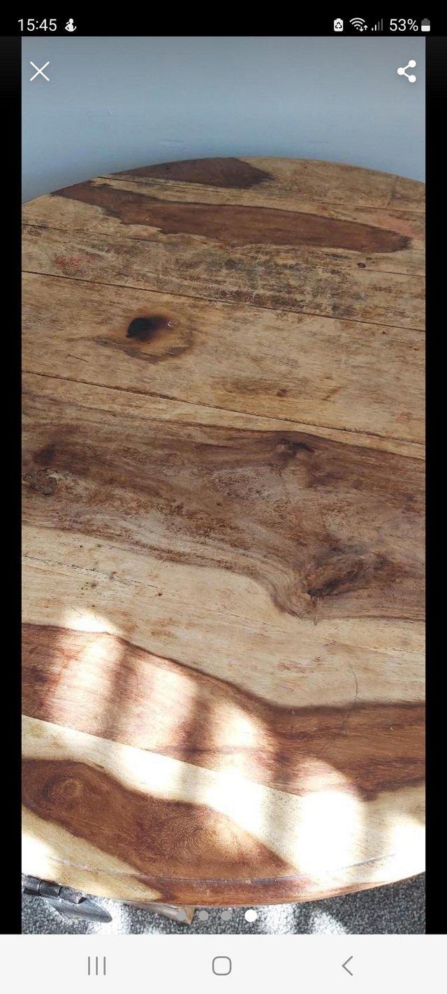 Preview of the first image of Coffee table..round sheesham wood coffee table...