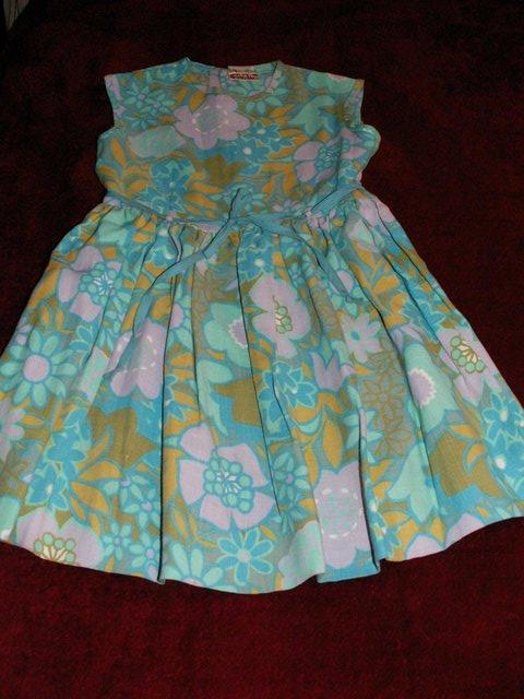 Preview of the first image of Childs dress. Vintage. floral design.