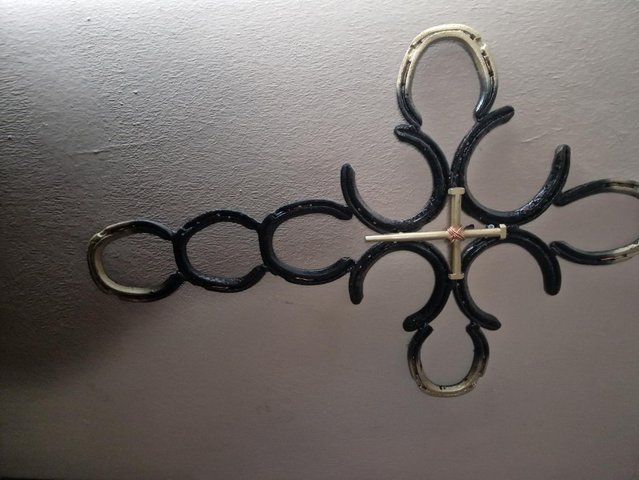 Preview of the first image of 10 horseshoe beautiful unique handmade cross.