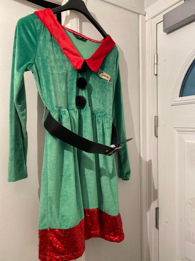 Preview of the first image of Christmas fancy dressMrs elf fancy dress outfit size 14.