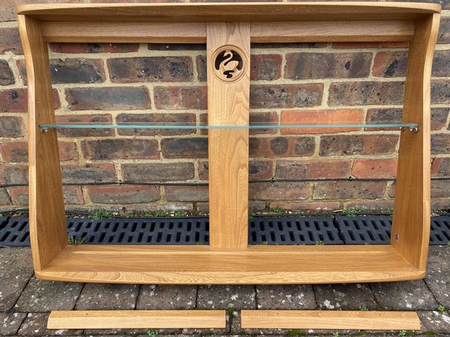 Preview of the first image of Ercol Elm Wall Plate Rack/Shelving with Swan Motif.