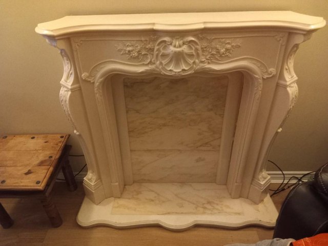 Preview of the first image of Cream fire surround, marble back and hearth.