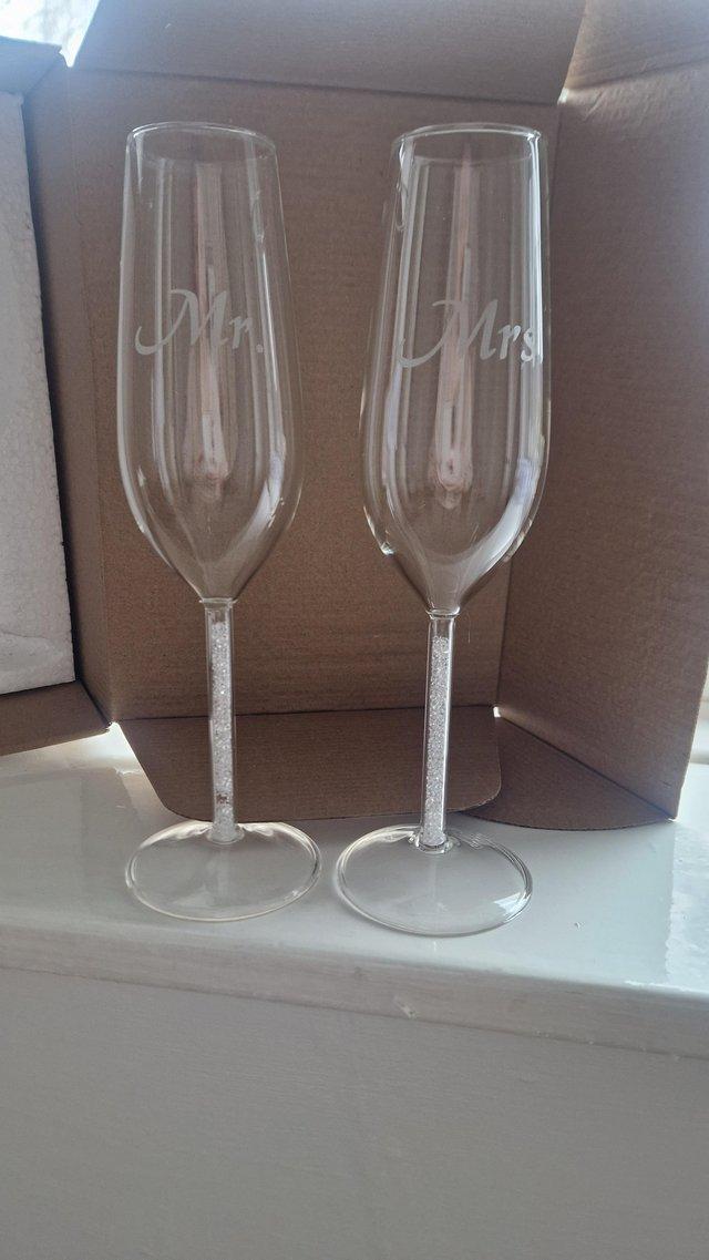 Preview of the first image of Wedding champagne flutes mr and mrs.