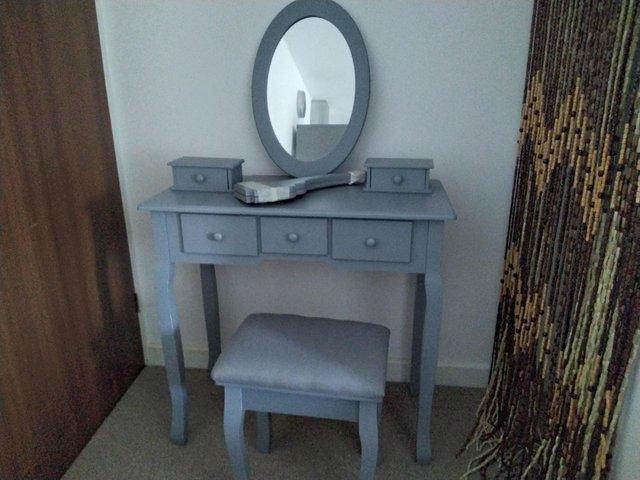 Preview of the first image of Vanity desk with drawers and mirror and stool.