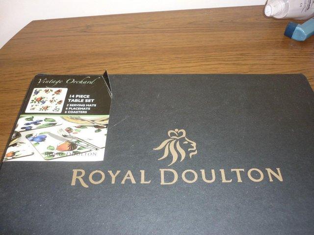 Preview of the first image of Royal Doulton 14 Piece Table Mat Set.