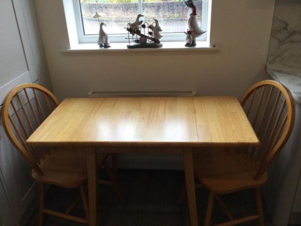 Image 1 of PINE KITCHEN TABLE AND TWO CHAIRS