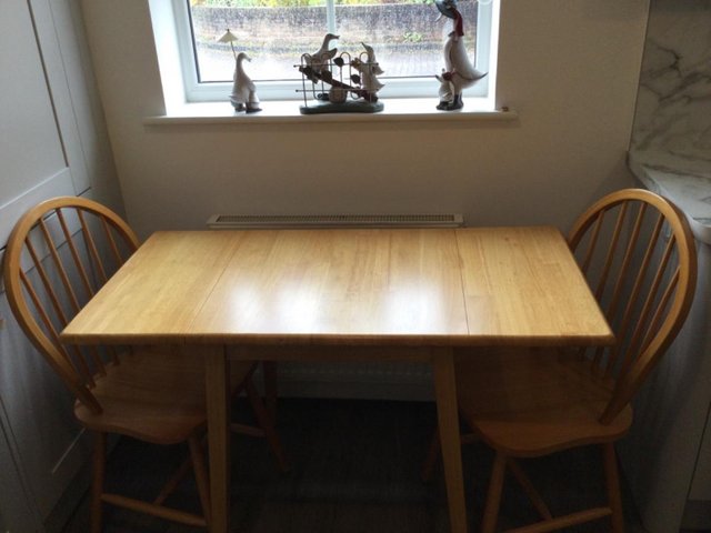 Preview of the first image of PINE KITCHEN TABLE AND TWO CHAIRS.
