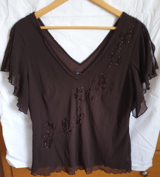 Preview of the first image of Dark brown polyester beaded top.