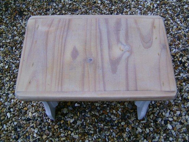 Preview of the first image of Wooden pine heart stool with natural top.
