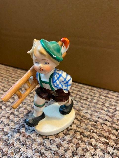 Preview of the first image of Vintage Hummel Figure Boy with ladder.