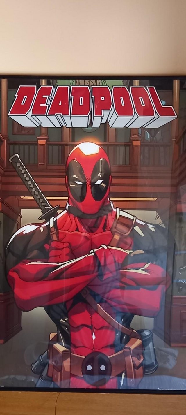 Preview of the first image of Framed Deadpool Poster Ideal For A Young Mans Man Cave.