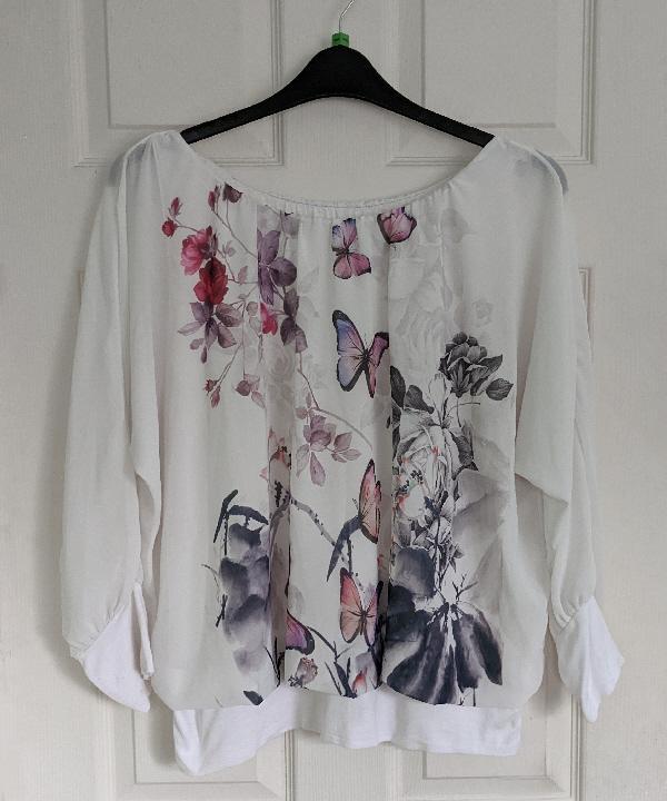 Preview of the first image of Lovely Ladies Made In Italy Butterfly Top.