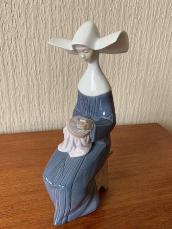 Image 1 of Lladro “ Blue nun with embroidery “.