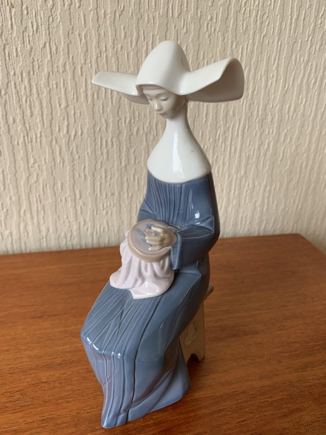 Preview of the first image of Lladro “ Blue nun with embroidery “..