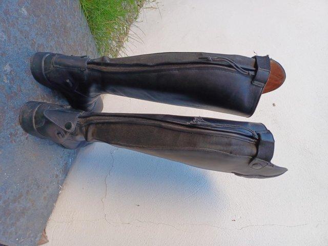 Preview of the first image of Long leather riding boots size 41.