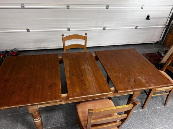 Image 1 of Extendable wooden dining table with 3 chairs