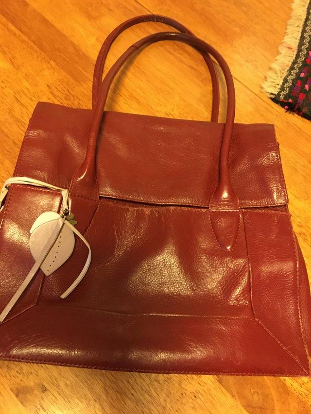 Preview of the first image of Radley vintage burgundy handbag.