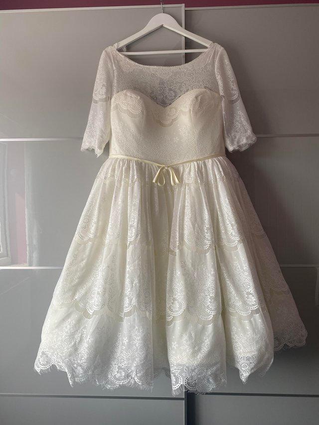 Preview of the first image of House of Mooshki Wedding dress.