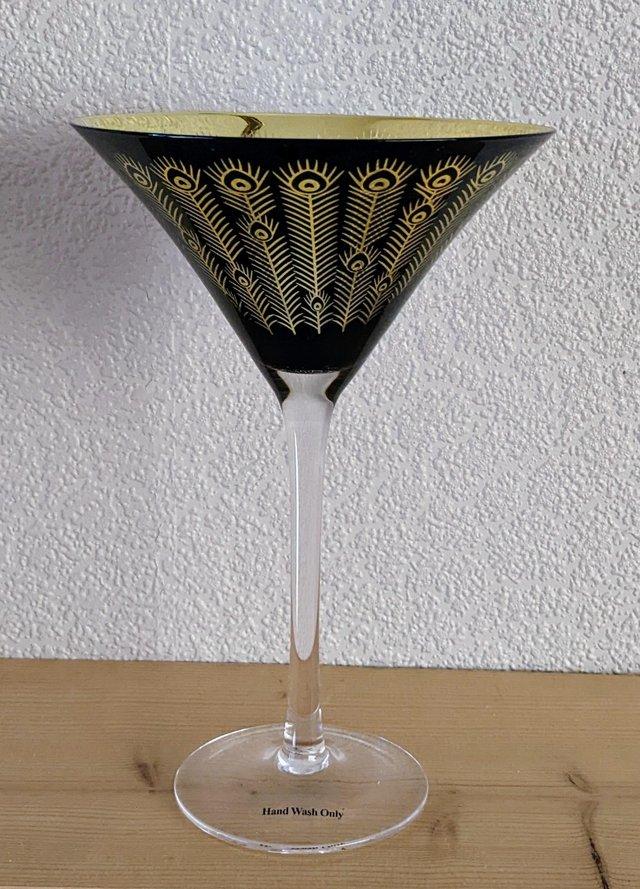 Preview of the first image of Single Midnight Peacock Cocktail Glass by Artland.