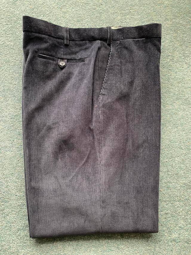 Preview of the first image of Gents charcoal grey needle cord trousers 42/31.