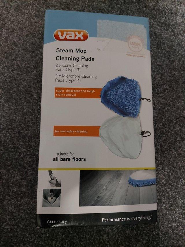 Preview of the first image of Vax cleaning pad 2 white and 2 blue.