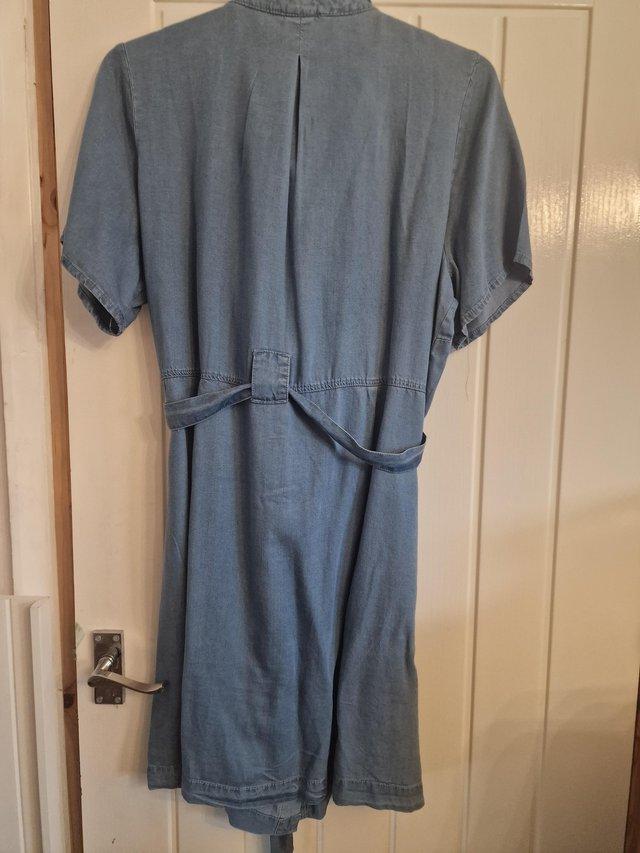 Preview of the first image of Ladies Denim dress. Never worn...as good as new size 18.