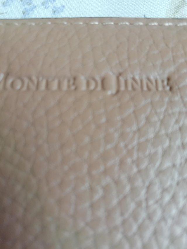 Preview of the first image of Taupe Monttedi jinne leather purse.