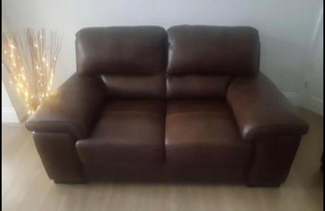 Preview of the first image of Italian soft brown leather 2 seater sofa.