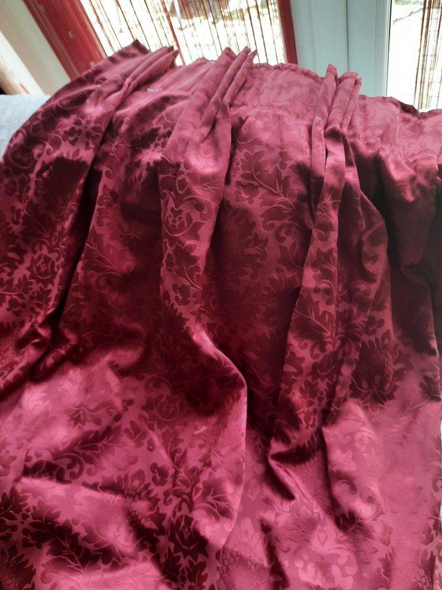 Preview of the first image of Deep red curtains fully lined.