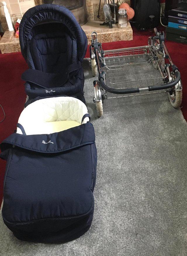 Preview of the first image of Very good condition silver cross pram.