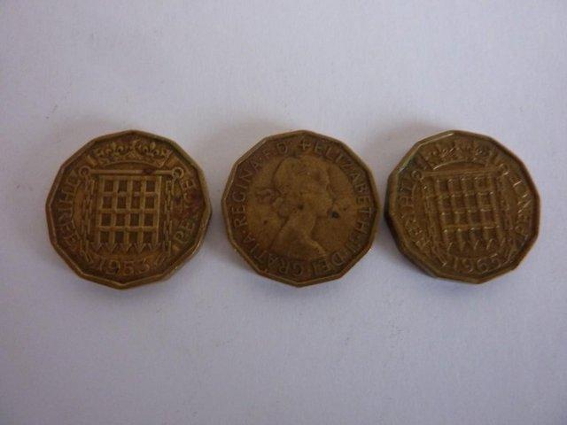 Preview of the first image of Three pre-decimal three-pence coins.