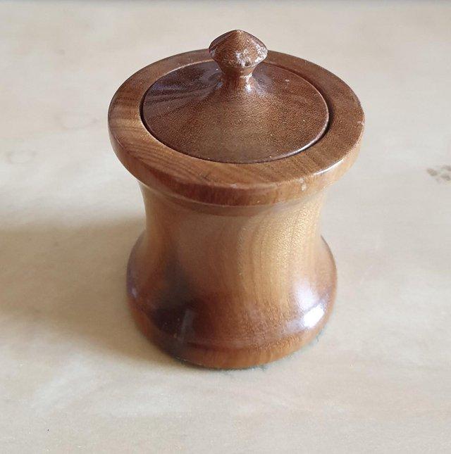 Preview of the first image of Small stinkwood pot with lid.