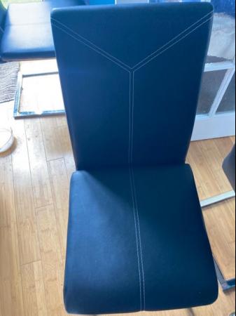 Image 1 of Black leather dining room chairs