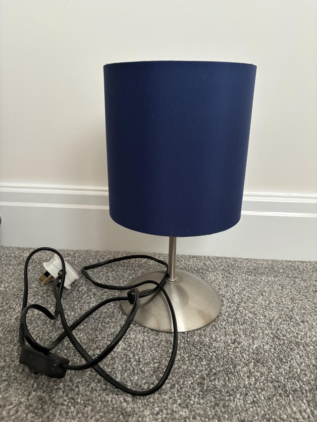 Preview of the first image of Blue Bedside lamp with silver base.