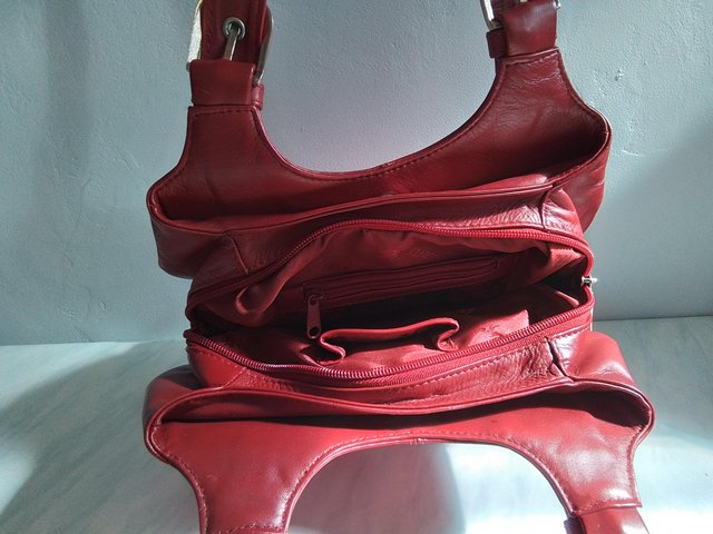Preview of the first image of Ladies SmallLeather Red Hand Bag.
