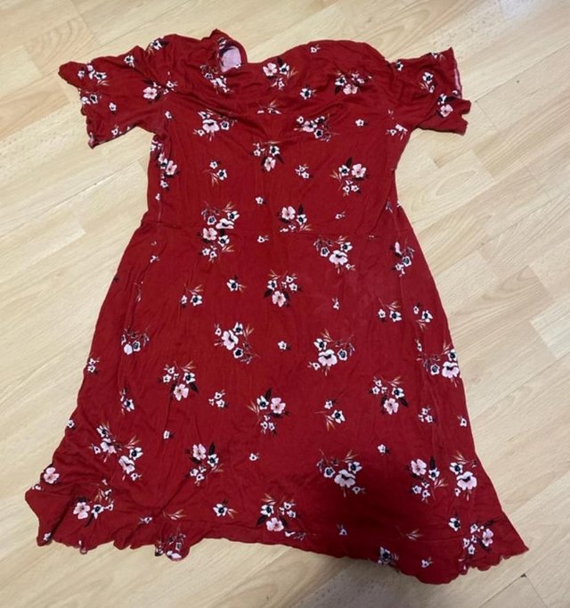 Preview of the first image of Red midi dress floral pattern from select.