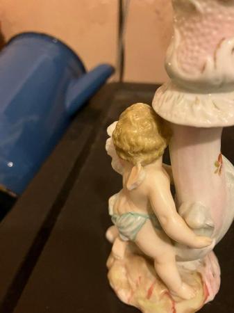 Image 3 of Small continental porcelain candlestick with cherub