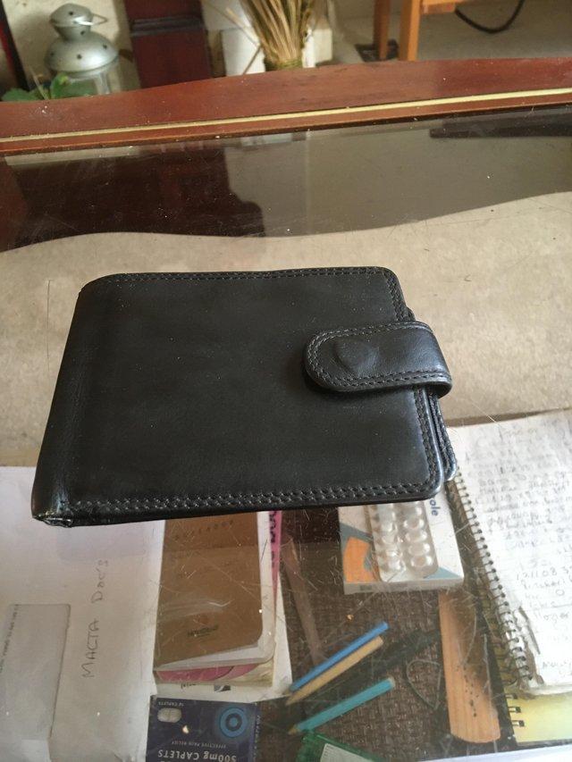 Preview of the first image of Black wallet in  good condition.