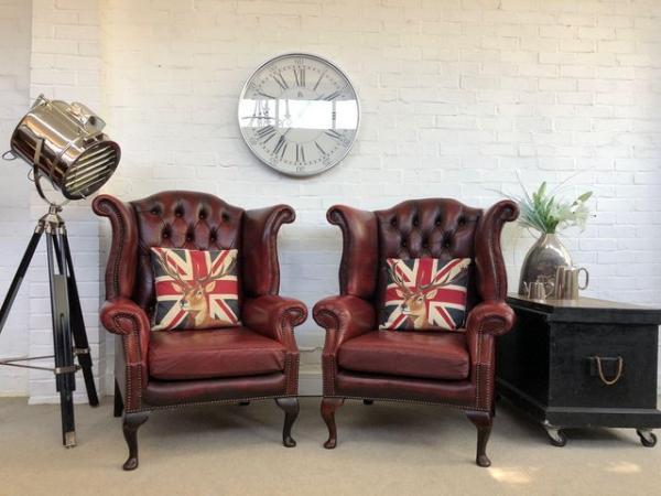 Image 1 of Pair vintage Oxblood Queen Anne chesterfield armchairs.