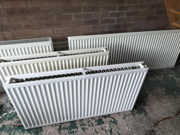 Image 1 of 5  white radiators. Various sizes