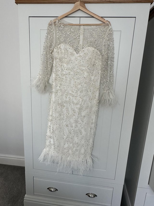 Preview of the first image of Gill Harvey mother of bride dress size 12.