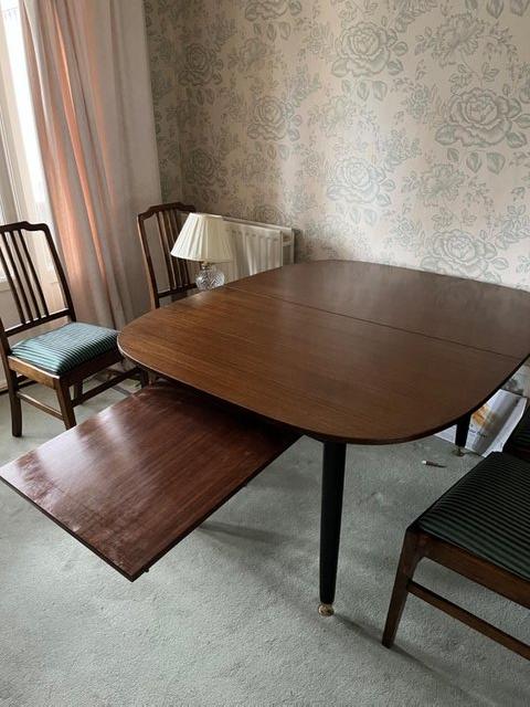 Preview of the first image of Dining table with extendable leaf.