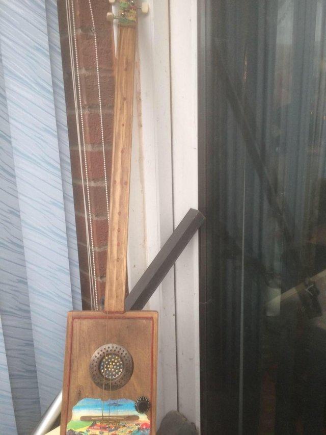 Preview of the first image of cigar box guitar built in amp..