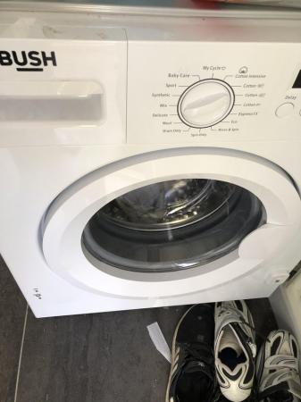 Image 1 of Bush integrated washing machine.