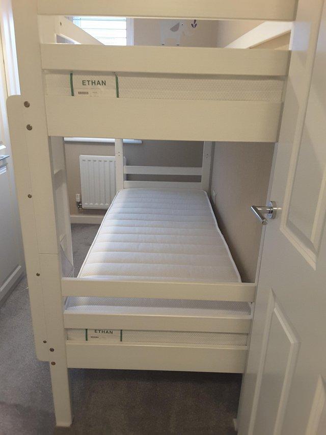 Preview of the first image of NEW UNUSED - Durham White Wooden Bunk Beds with Mattresses.