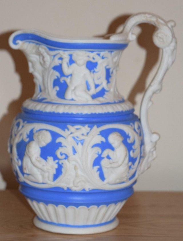 Preview of the first image of 1852 STAFFORDSHIRE SMEAR-GLAZED STONEWARE JUG.