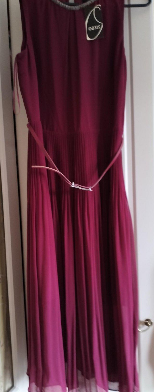 Preview of the first image of Oasis dress midi length brand new.