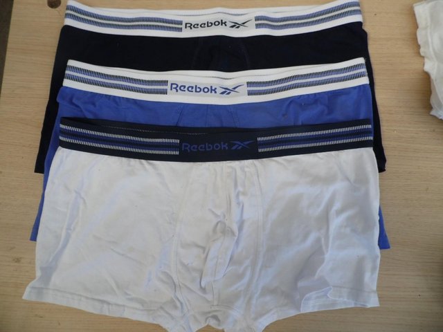 Preview of the first image of THREE pairs of genuine Reebok boxer shorts - size XL.